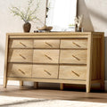 Wooden dresser with six drawers in a room setting