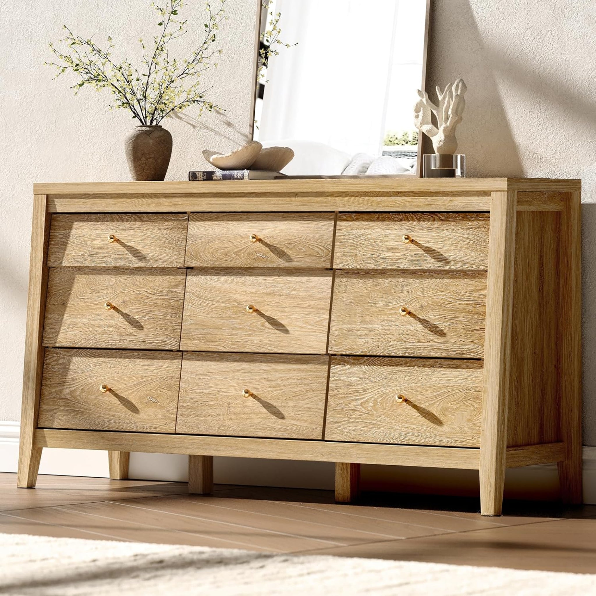 Wooden dresser with six drawers in a room setting