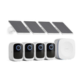 Set of security cameras with solar panels on a white background